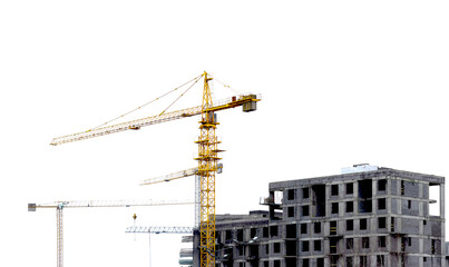 Silhouette of construction crane at building site, symbolizing real estate development and urban