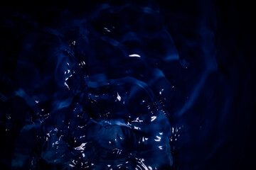 Water surface and blue waves.
