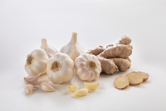 Ginger and garlic bulb group shot on a white background