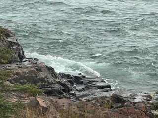 waves crashing on rocks
