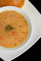 Nourishing vegetable creamy Soup: Bowls of bean soup with vegetables 