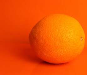 Orange fruit with Orange Background and rule of third