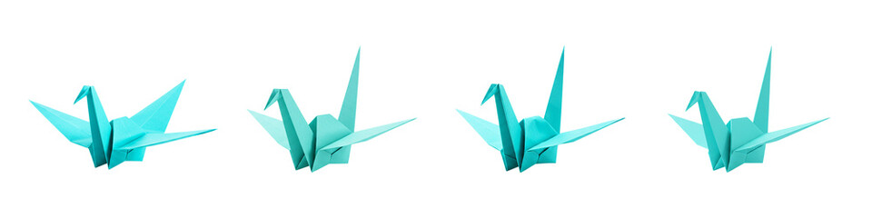 Four origami cranes symbolize hope and peace in a stunning display of artistry and craftsmanship