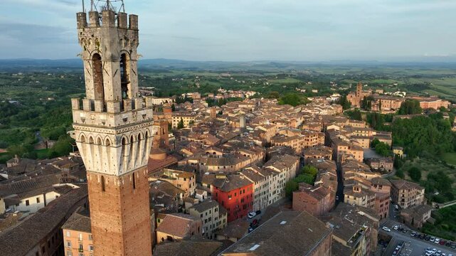 aerial view of Siena town in Tuscany, Italy, Torre del Mangia and Piazza del Campo in Siena, travel in Italian region of Tuscany