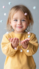 Joyful child in winter attire with falling snow-like confetti for festive design