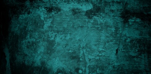A textured background featuring a deep teal color with a distressed, grunge appearance. The surface shows variations in tone and subtle patterns, creating an abstract and moody aesthetic.