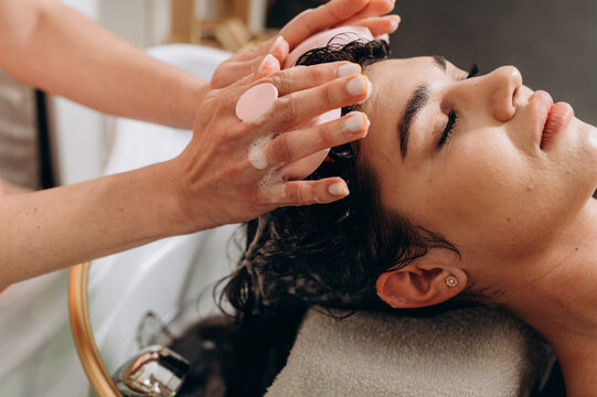 "Spa scalp shampoo session with foaming bubbles and vibrating electric massager for relaxation