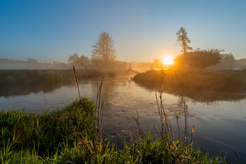 Scenic River Sunrise With Dewy Web