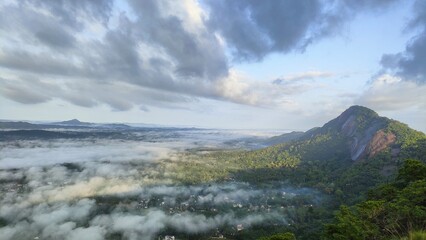 Massive cloud bed near a mountain