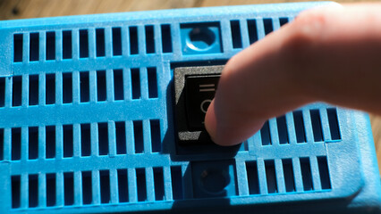 Finger pushes on KCD1-101 6c Rocker Switch electrical component rocker-style actuator for on off on control. Offers as a simple reliable switching mechanism, with a durable. High quality photo.