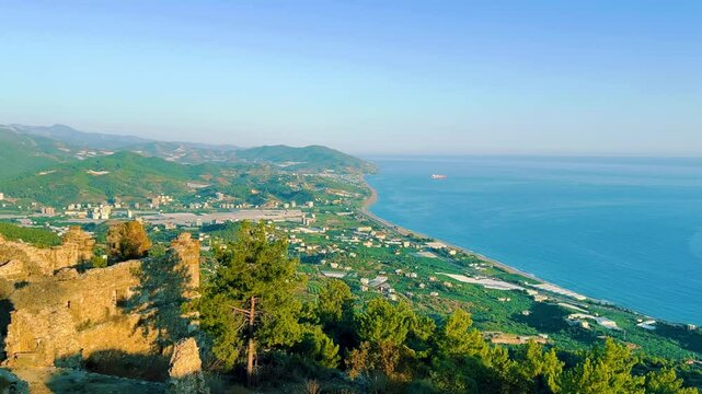 Ruins of the ancient Roman port city of Siedra in Alanya, Antalya, Turkey. The street and ruins of the ancient abandoned ancient city of Siedra on the Mediterranean coast. 4К	