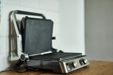 This electric grill has a nonstick surface and adjustable temperature controls for your convenience
