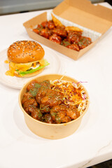 Korean deep dried chicken on white rice with soy garlic sauce.