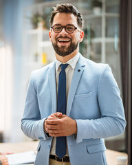 Portrait of a well-dressed caucasian businessman standing in office