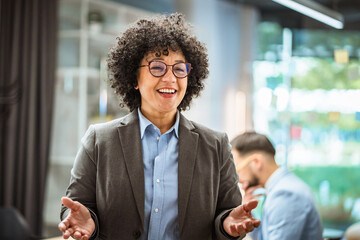 mature african american businesswoman leader stand in office