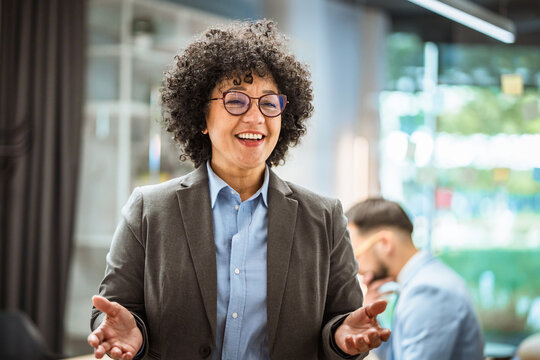 mature african american businesswoman leader stand in office