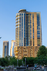 Skyscrapers, office buildings and hotels in the city skyline at Romare Bearden Park in uptown Charlotte North Carolina USA