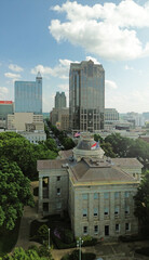 Aerial view of the downtown Raleigh NC skyline with the state capitol building in the foreground