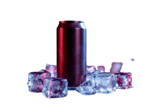 A sleek red can surrounded by glistening ice cubes against a stark black background in a studio shot