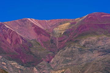 Selbstklebende Fototapeten A stunning panoramic view of the Tilcara Valley in Jujuy Province, Argentina, where rugged mountains and vibrant desert hues create a mesmerizing Andean landscape © Jopstock