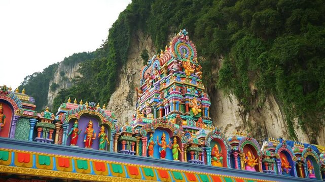 day time kuala lumpur area famous temple entrance decoration slow motion panorama 4k malaysia