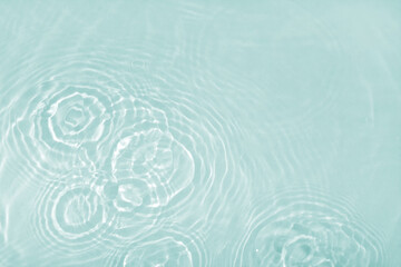 Background with clear blue water. Water background with small bubbles. transparent water surface...