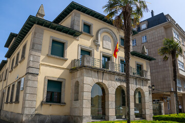 Naklejka premium Architecture of the Customs and Excise Administration in Ribadeo, Spain. Shot from Plaza España in the heart of the town.