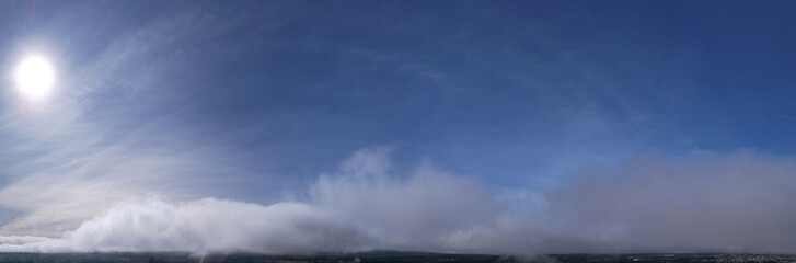 Obraz premium Morning mist or fog dissipating by the rising sun, Aerial cloudscape
