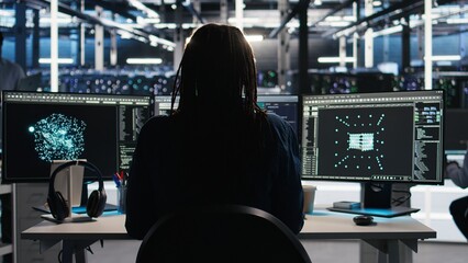 Data center computer scientist using node tree software to analyze datasets. Server farm IT worker...