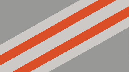 Fototapeta premium Abstract composition with diagonal orange and white stripes on a gray backdrop