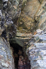 Stunning rock arches and caves at Playa de las Catedrales (Beach of the Cathedrals), Ribadeo, Lugo, Galicia, Spain, visible only at low tide. Unique coastal landscape for nature lovers.