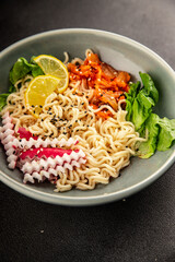Noodle Bowl vegan fresh delicious gourmet food background on the table rustic food top view copy space keto and paleo diet vegan and vegetarian food