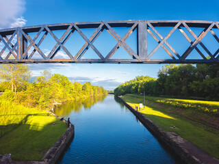 Ultra-wide view of Lock 20 State Canal Park and walking trail located at Marcy, New York, it is historic canal lock, built in 1822 on the Erie Canal, linking Albany to Buffalo at Lake Erie