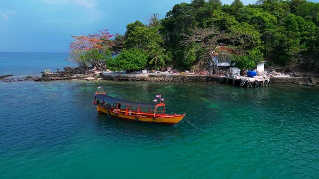 boats at small Privat tropical island. Unique aerial view flight drone