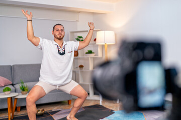 Yoga instructor streaming online class from home