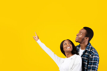 Amazing offer, something unusual and place for advertising or text. Surprised happy zoomers african...