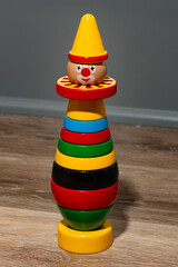 Isolated colorful stacking wood toy clown