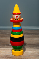 Isolated colorful stacking wood toy clown