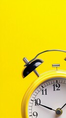 Vibrant yellow background showcases a classic analog alarm clock with black details, symbolizing time management, punctuality, and morning routine urgency