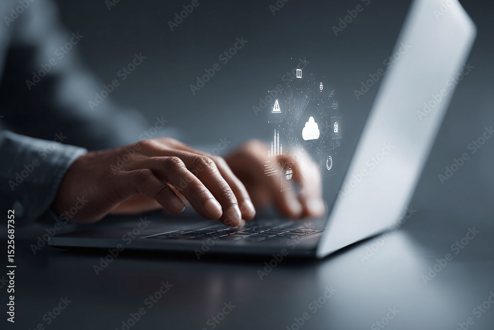 Poster person typing on laptop with digital overlay representing cloud computing and data management. showc