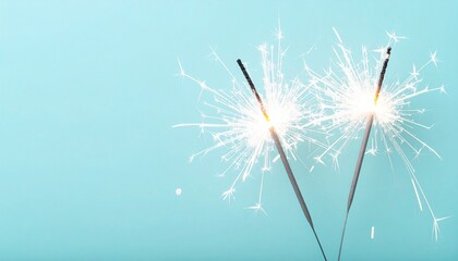 White Sparklers on a Light Blue Background