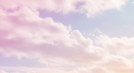 Obraz premium Beautiful pastel sky with fluffy clouds in shades of pink, purple and blue