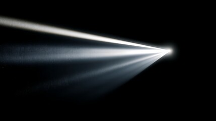 Close up view of a light ray on a black backdrop