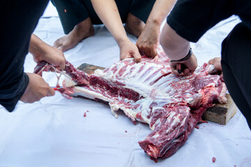some people are cutting mutton