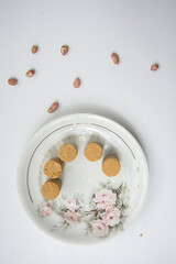 Fototapeta premium Paçoca , peanuts and crackers on a white background. Close-up.