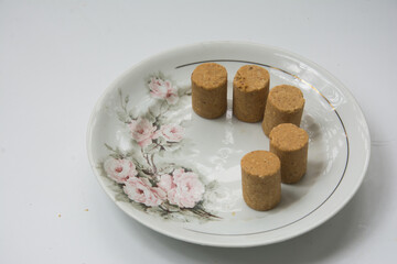 Paçoca , peanuts and crackers on a white background. Close-up.