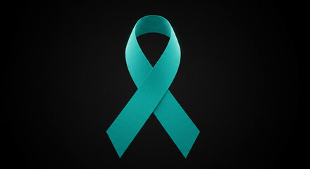 Teal ribbon representing awareness against gynecological cancer on a black background