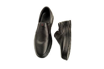 black men's shoes showing off the finest details and craftsmanship on a clean white background