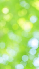 Obraz premium Abstract Green Nature Bokeh Background, Light Spots, Summer, Spring, Fresh, Lush, Vibrant, Blurred, Soft Focus, Green Tones, Nature Photography