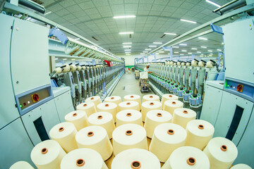 Workers are working in the production workshop of the spinning mill